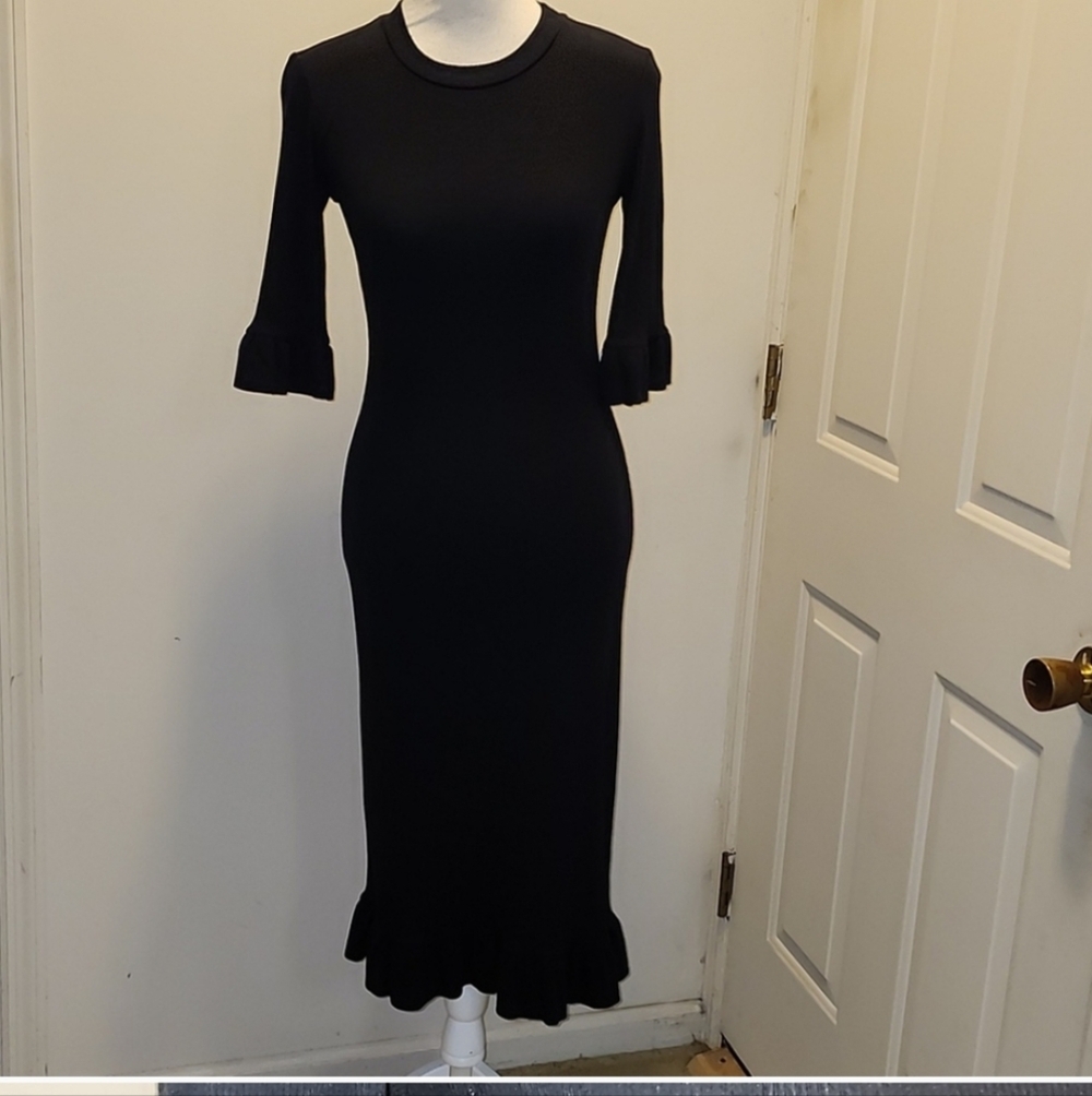 Stateside black ribbed fitted dress with ruffles sleeve & bottom Cozy Sheath